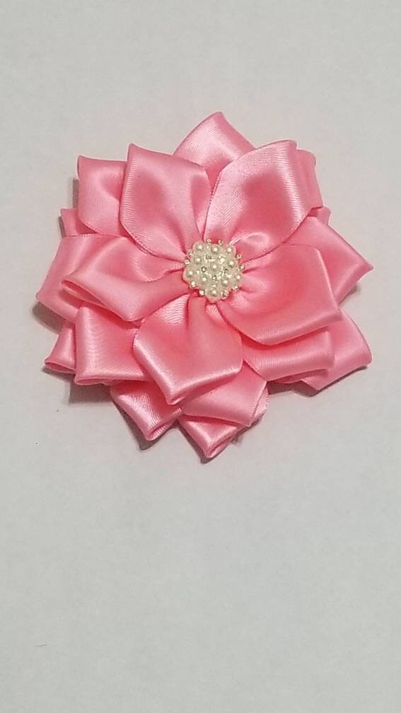 Pink brooched flower